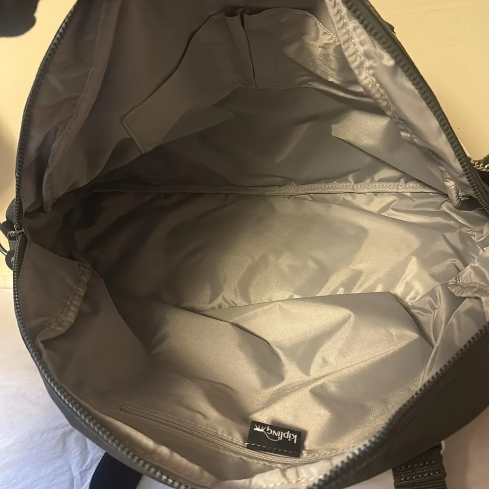 Kipling Black Duffel Bag, new, outside pockets, inside pockets, unisex